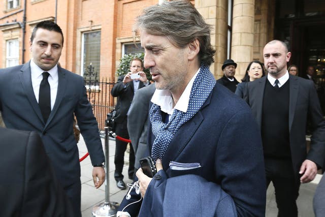 Former Manchester City manager Roberto Mancini yesterday left the London hotel where his team stayed for the FA Cup final