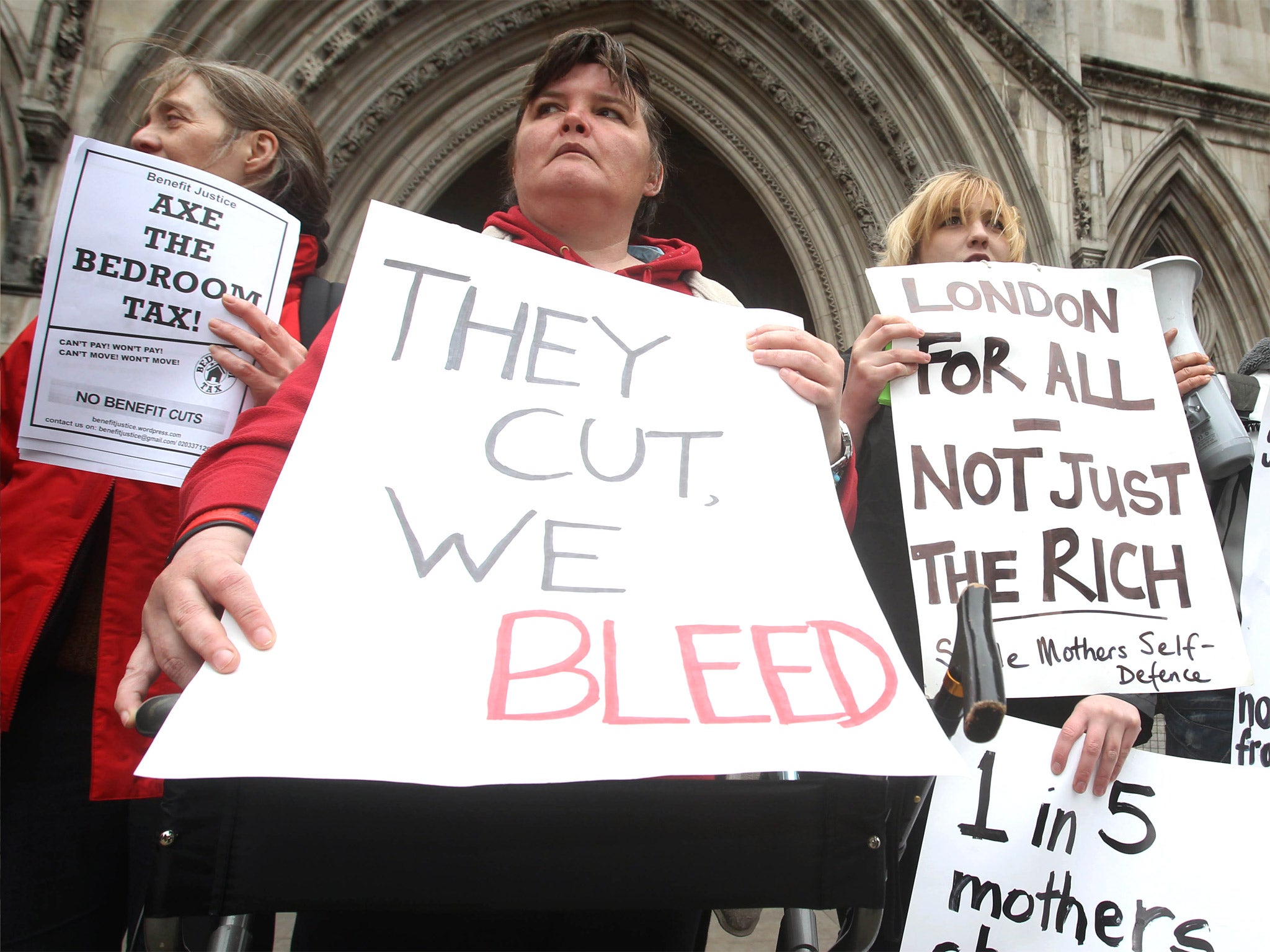 Protesters against the bedroom tax gather outside the Royal Courts of Justice in London
