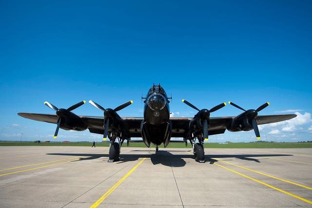 A WWII Lancaster bomber sits on the runway before take off at RAF Scampton in Lincoln.  Ladybower and Derwent reservoirs were used by the RAF's 617 Squadron in 1943 to test Sir Barnes Wallis' bouncing bomb before their mission to destroy dams in Germany's Ruhr Valley.