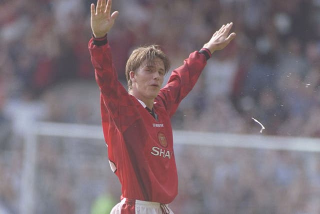 David Beckham celebrates his goal from behind the half-way line against Wimbledon in 1996 
