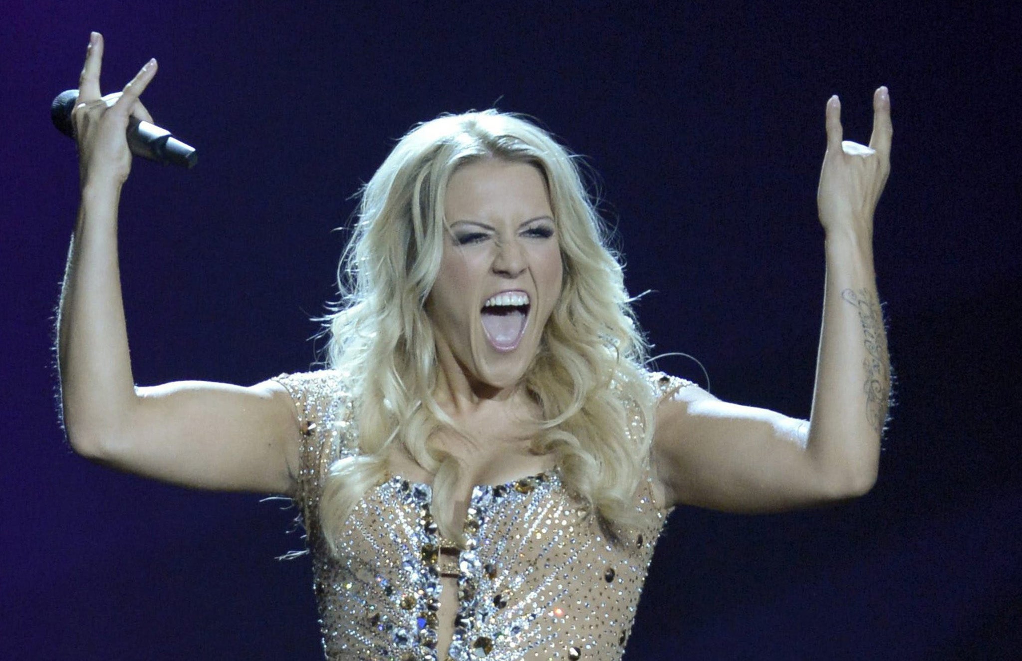 Germany: Cascada performing 'Glorious' Cascada has had a decade of success global hits including "The Rhythm of The Night" and "Summer Of Love". Singer Natalie Horler is the daughter of acclaimed jazz musician David Horler. German songwriters an