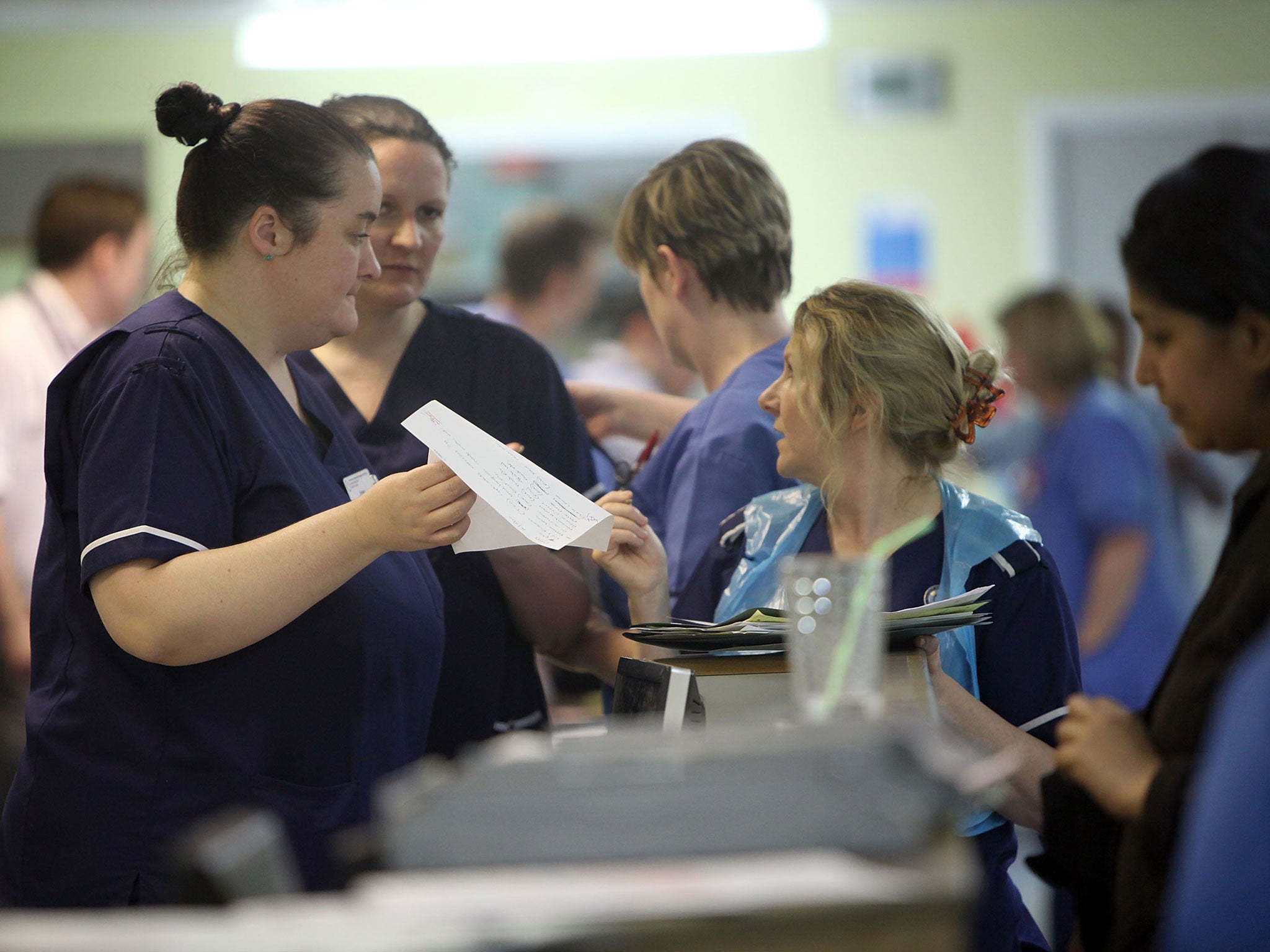 Nurses in the accident and emergency dept of Selly Oak Hospital work during a busy shift on March 16, 2010 in Birmingham, England.
