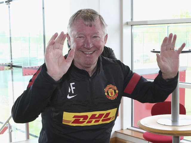 Sir Alex Ferguson in his sponsored United training top at his last Friday press conference