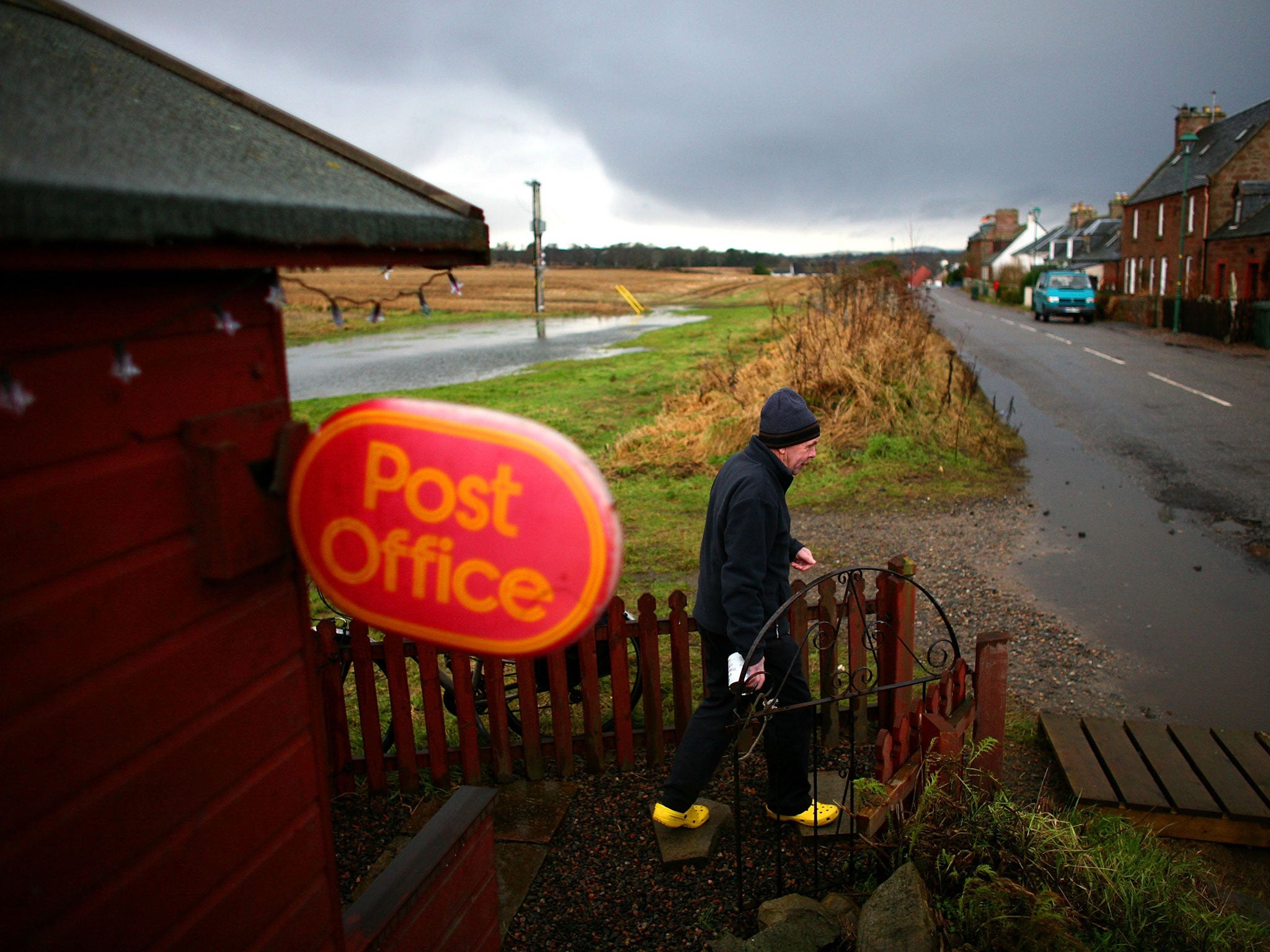 Post Office apologises to former postmasters for unfair convictions linked to accounting scandal