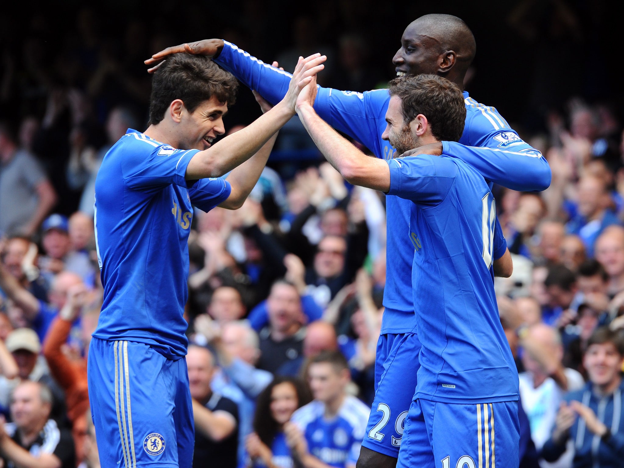 Juan Mata celebrates after opening the scoring at Stamford Bridge