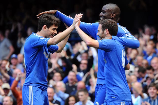 Juan Mata celebrates after opening the scoring at Stamford Bridge