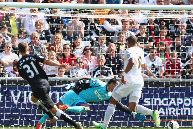 Alexander Kacaniklic opens the scoring for Fulham in their 3-0 win over Swansea