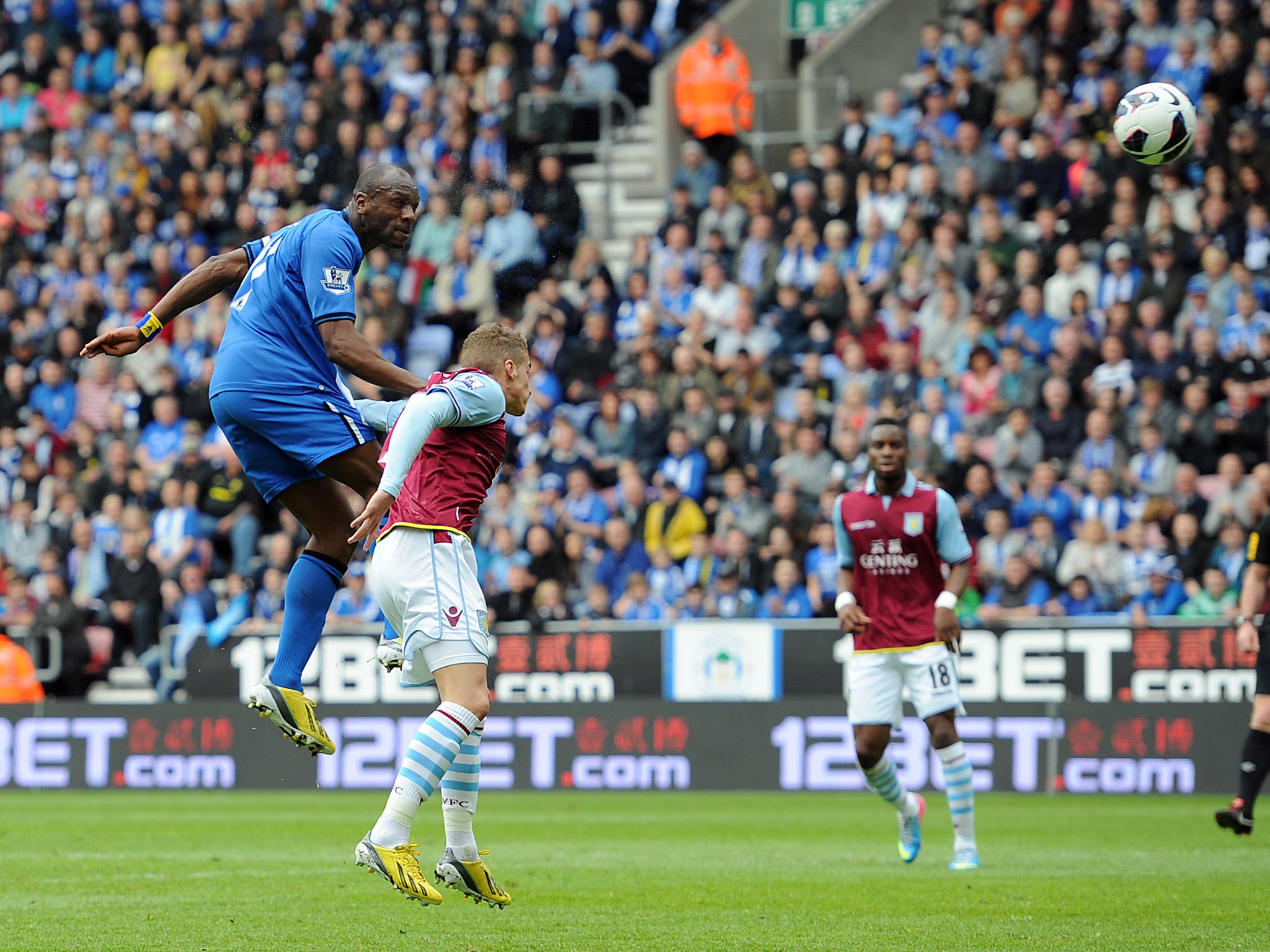 Emmerson Boyce of Wigan Athletic heads his side's first goal during the 2-2 draw with Aston Villa