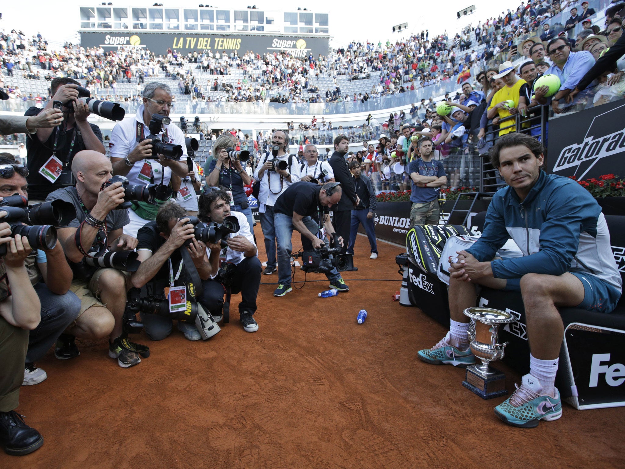 Spain’s Rafael Nadal with the trophy after thrashing Roger Federer in Rome
