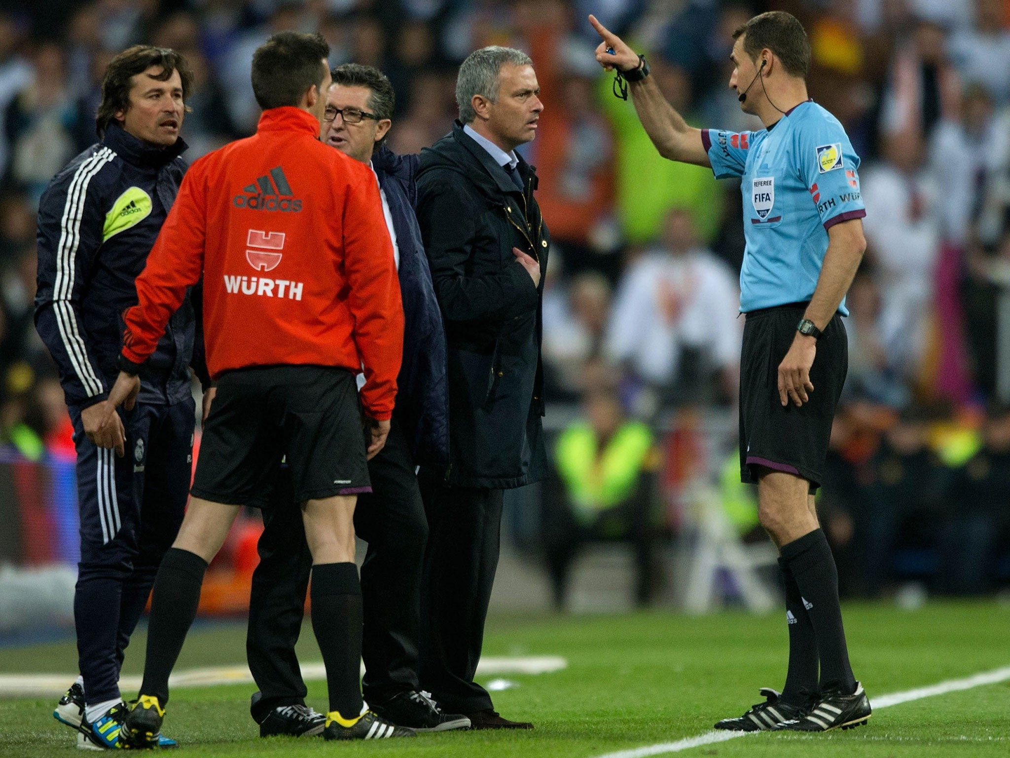 Referee Clos Gomez tells Jose Mourinho to leave the pitch