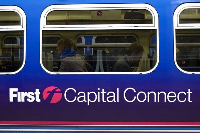 Commuters on a First Capital Connect Service as FirstGroup announced a £615 million fundraising and cancelled its dividend after plans to turn around the business were derailed by the West coast mainline fiasco