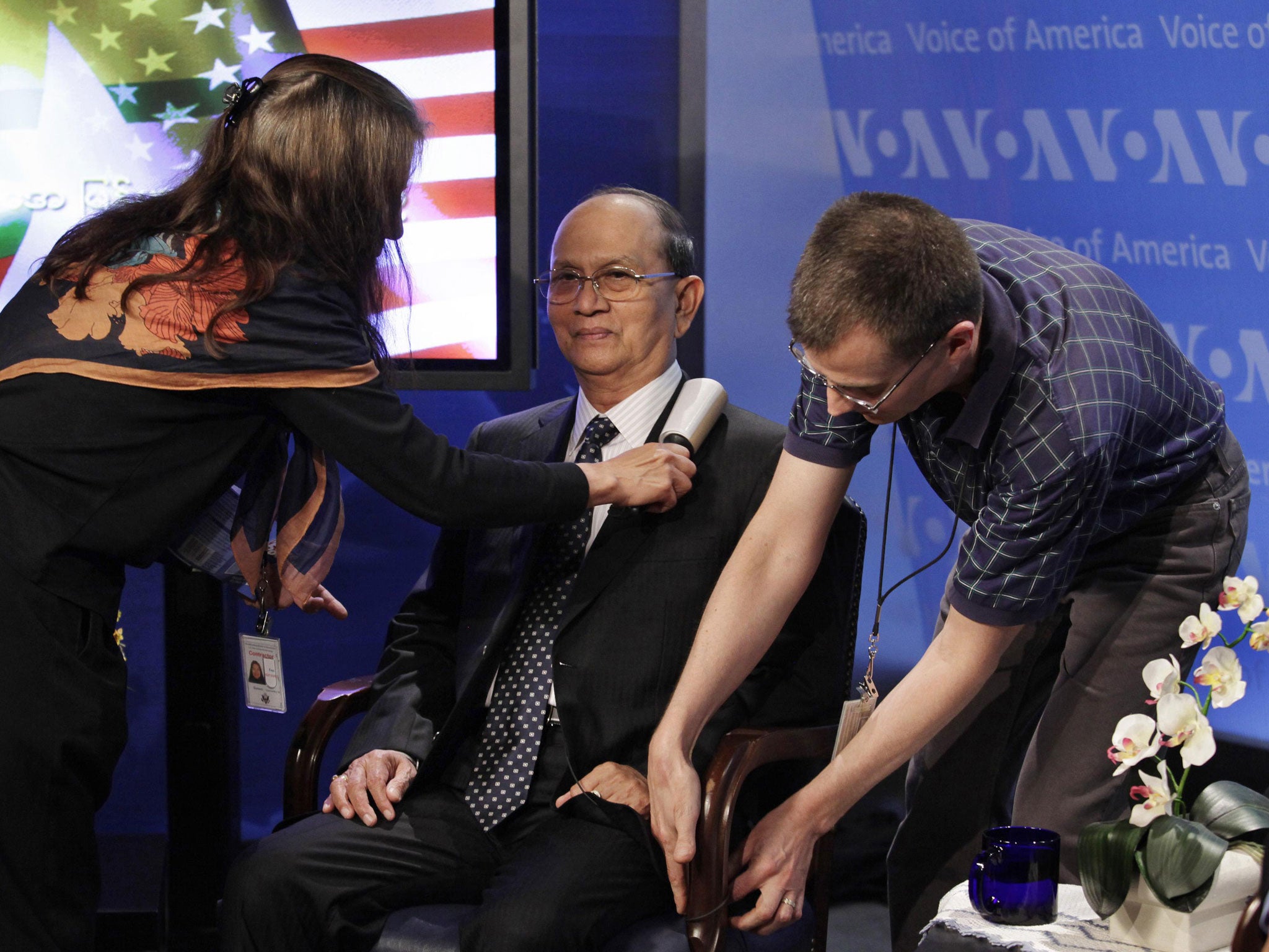 Voice of America staff prepare Burmese President Thein Sein before a Washington appearance