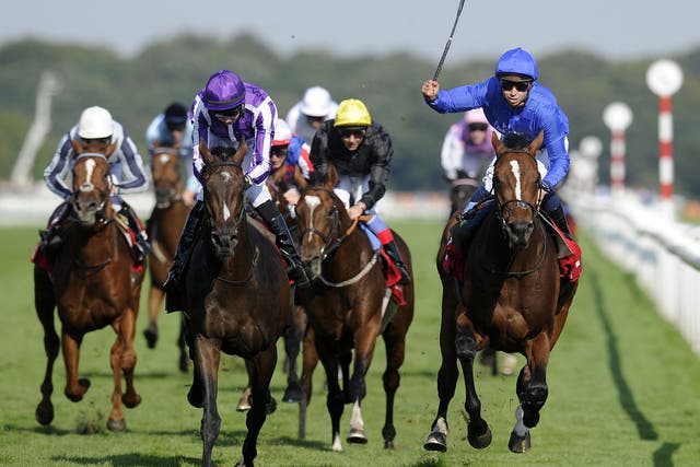 Encke, right, denies Camelot (purple and white) the Triple Crown by winning the St Leger