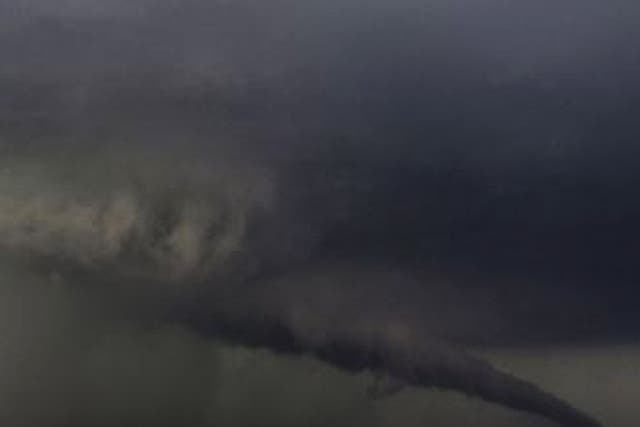 The funnel of a tornado almost touches the ground yesterday  near South Haven, Oklahoma