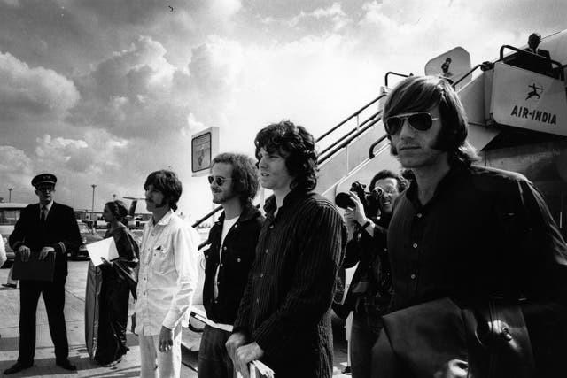 American rock group The Doors arrive at London Airport in 1968. From left to right; John Densmore, Bobby Krieger, Jim Morrison (1943 - 1971) and Ray Manzarek.