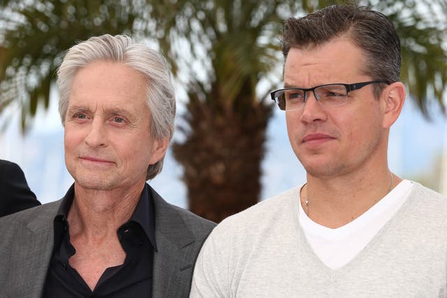 Actors Michael Douglas and Matt Damon attend the 'Behind The Candelabra' photocall 