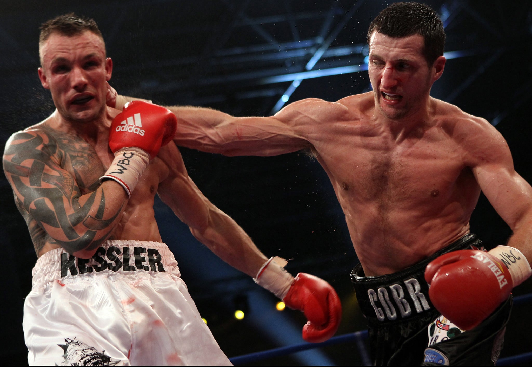 Carl Froch lands a right on Mikkel Kessler when the two first met in 2010
