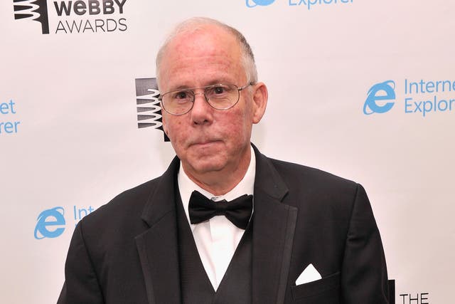Steve Wilhite, inventor of the GIF file, poses with an award backstage at the Webby Awards. He says the file should be pronounced 'jif' not 'gif' with a hard 'G'. 