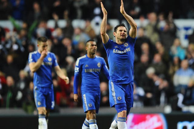 Frank Lampard applauds the crowd with Ashley Cole and Gary Cahill looking on