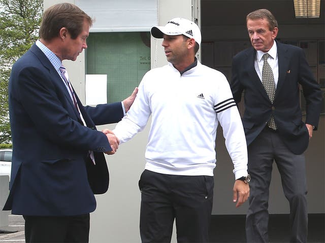 Sergio Garcia leaves a meeting at Wentworth yesterday, with George O’Grady, chief executive of the European Tour, (left) and Tim Finchem, the PGA Tour Commissioner