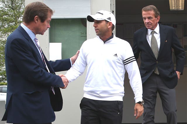 Sergio Garcia leaves a meeting at Wentworth yesterday, with George O’Grady, chief executive of the European Tour, (left) and Tim Finchem, the PGA Tour Commissioner