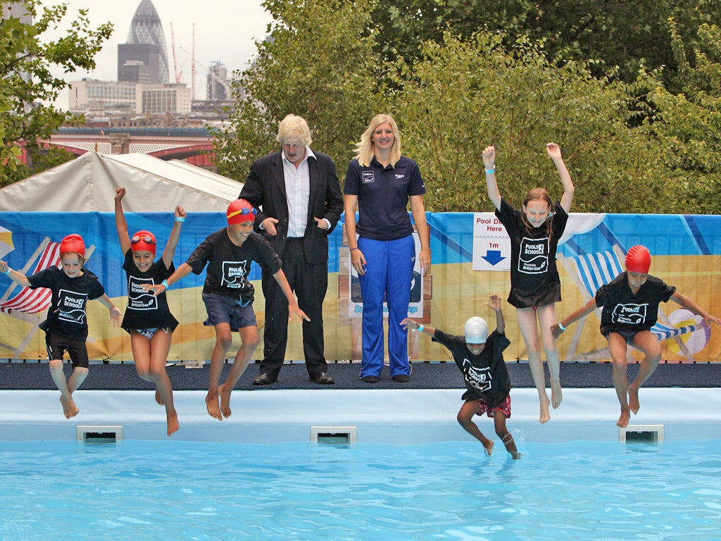 Swimmer Rebecca Adlington and Mayor of London Boris Johnson join school children to help launch the 'Pools 4 Schools' initiative in 2009