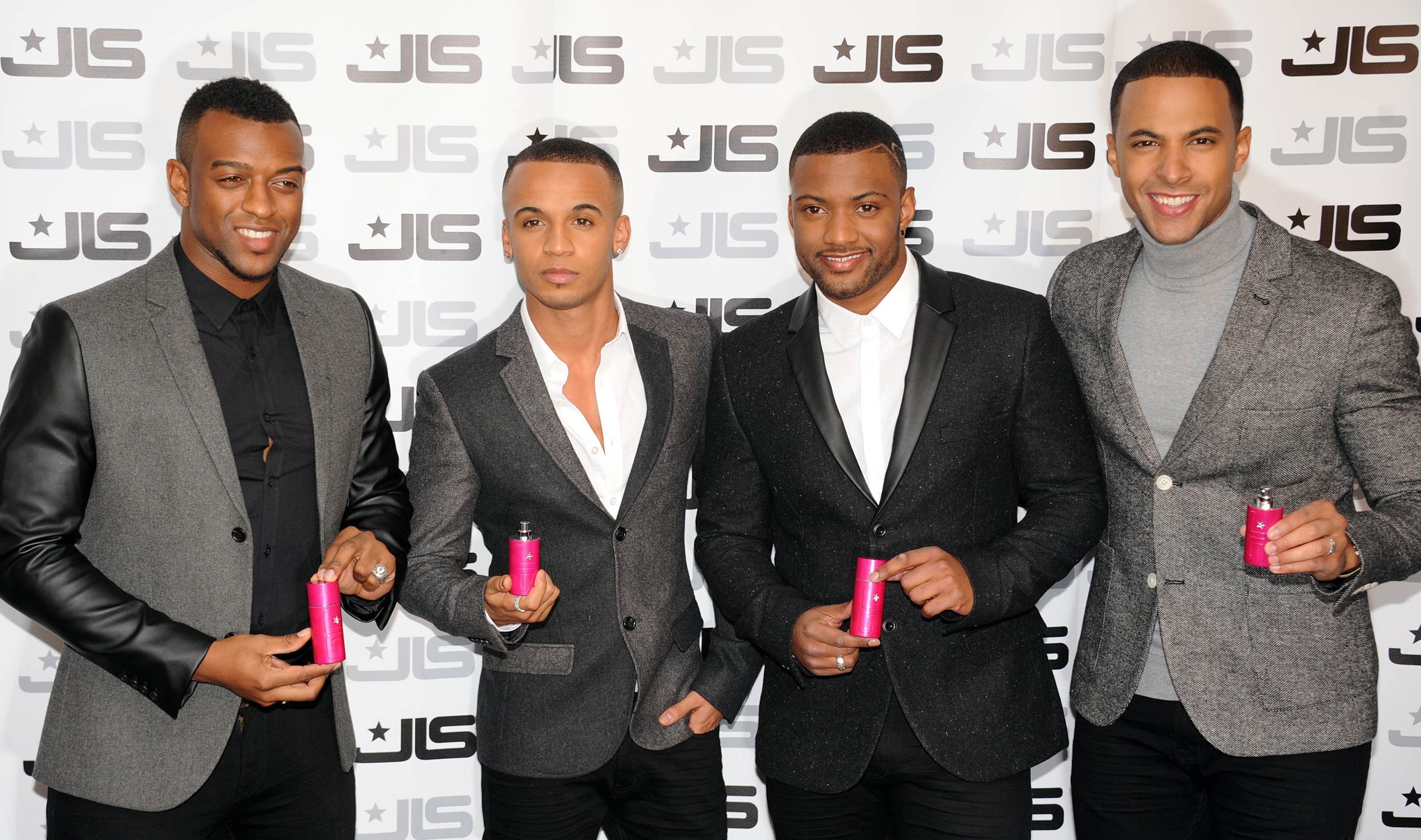 Oritse Williams, Aston Merrygold, JB Gill and Marvin Humes of JLS attends a photocall to launch the new JLS female fragrance 'LOVE' at One Mayfair on January 31, 2013 in London