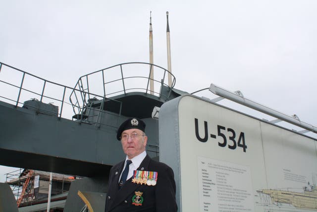 Chris Durban beside a U-534