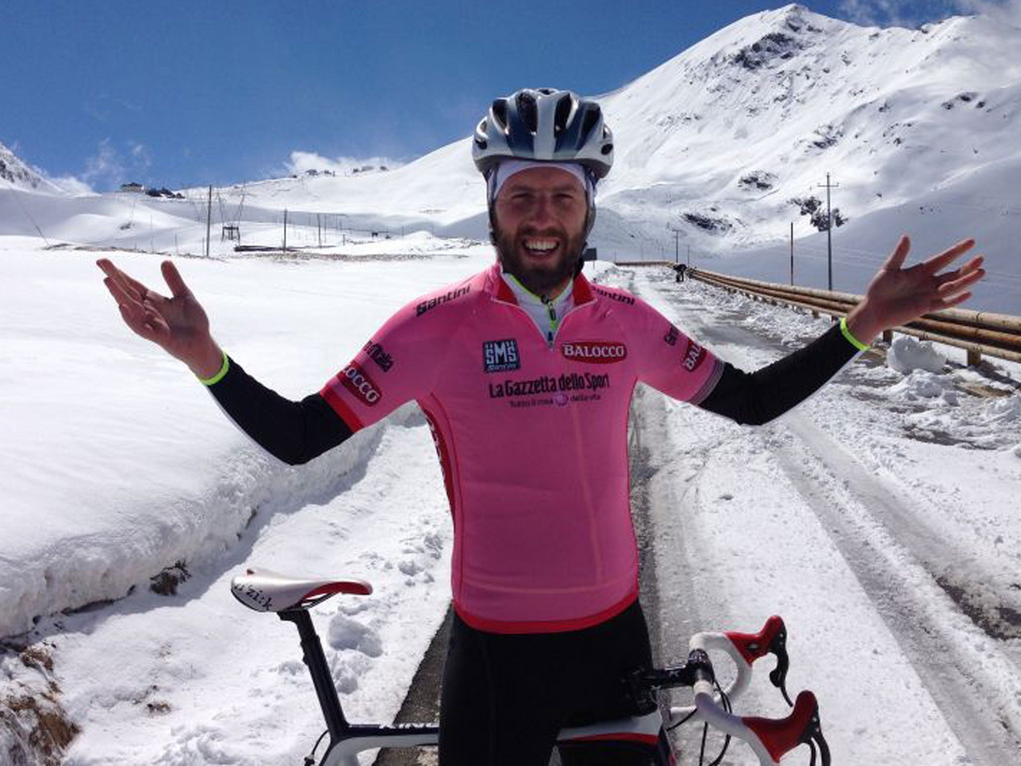 Simon Usborne takes on the snow, the endless hairpin bends of the Stelvio Pass and tries on the pink jersey of the Giro leader