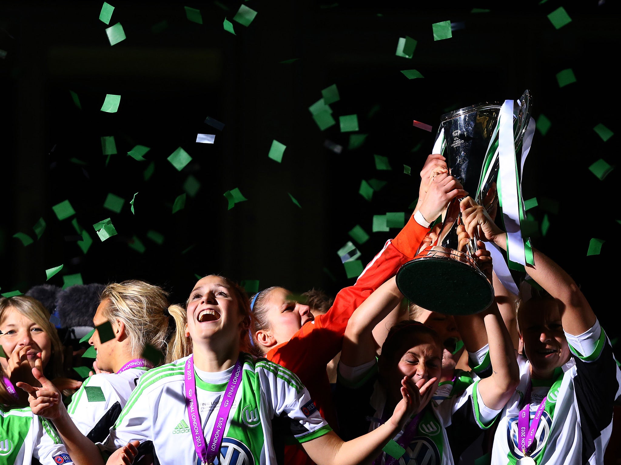 Wolfsburg players celebrate with the trophy after winning the UEFA Women's Champions League final match between VfL Wolfsburg and Olympique Lyonnais