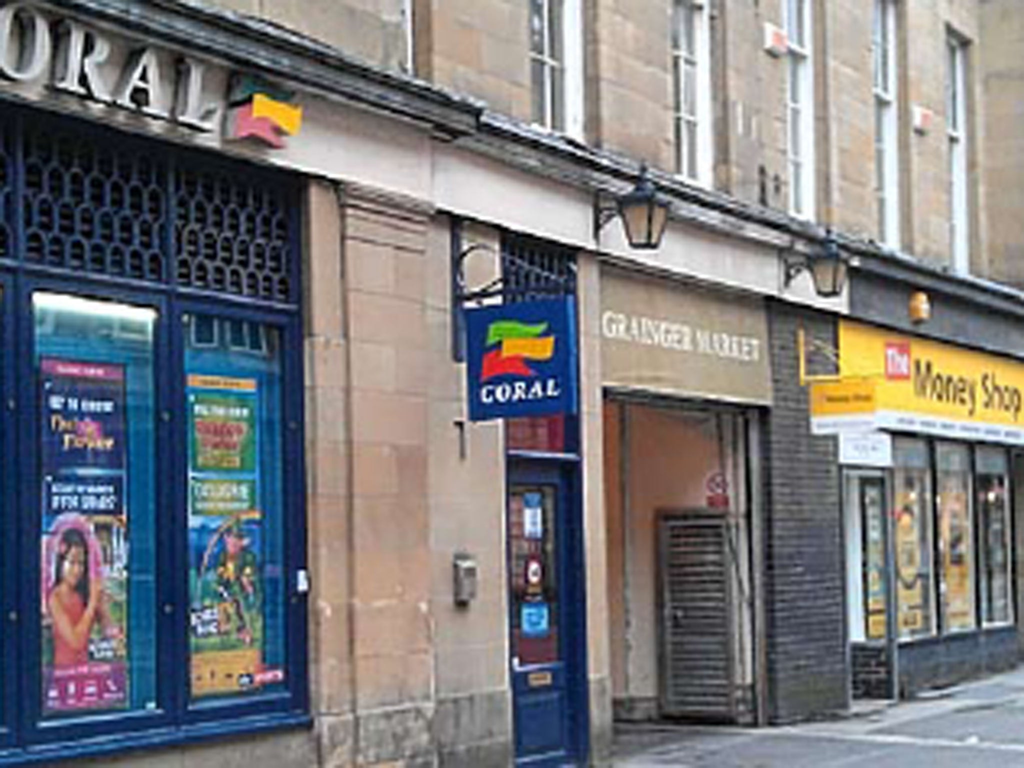A bookmaker and a branch of The Money Shop almost cheek by jowl in a street in Newcastle