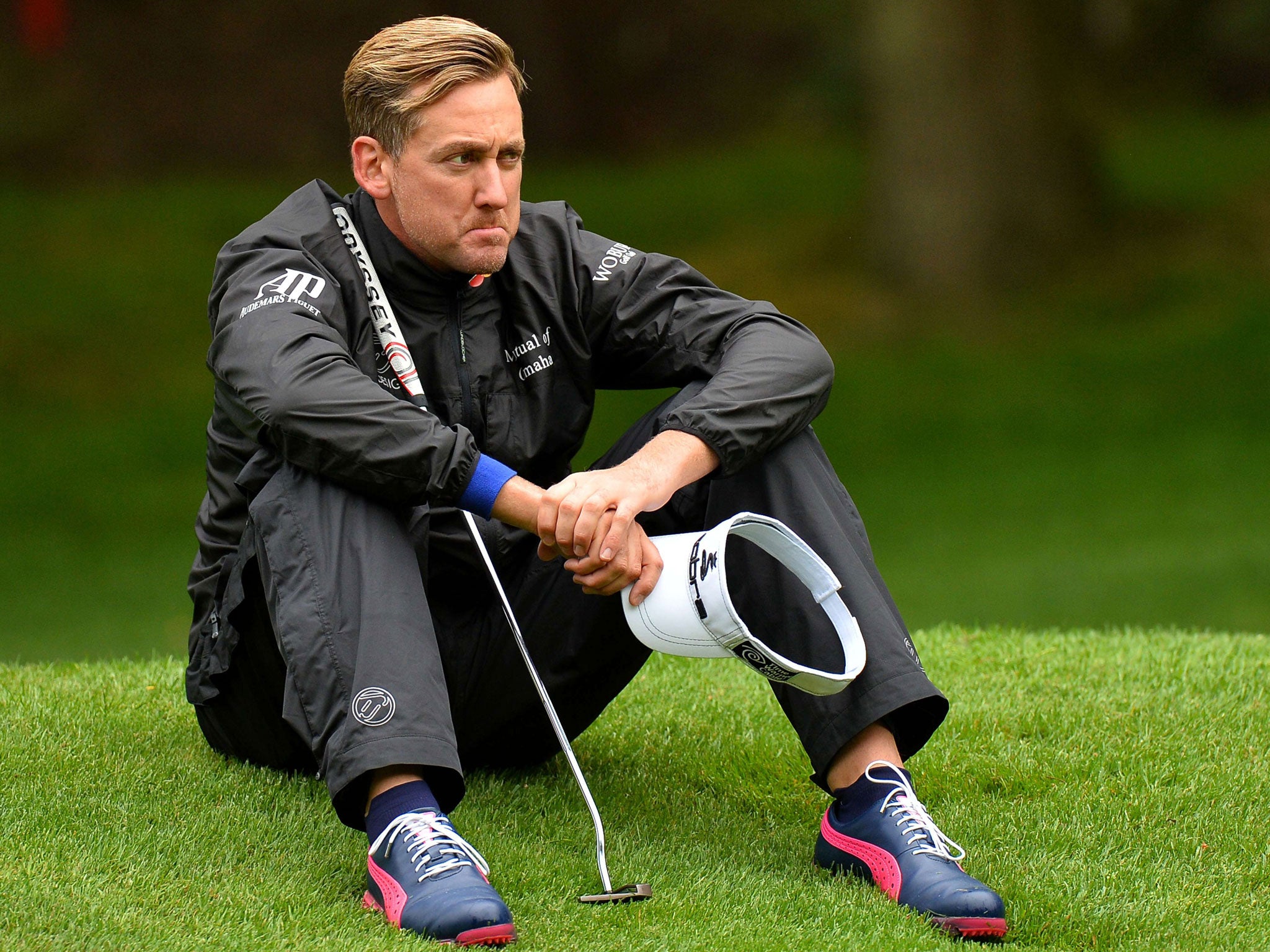 Ian Poulter looks dejected at the 13th hole