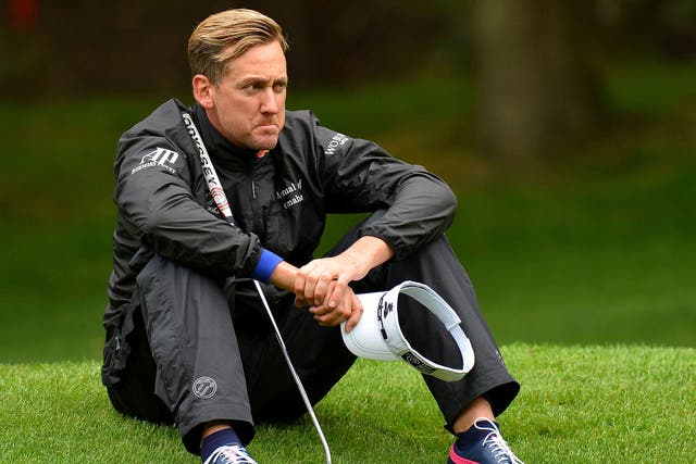 Ian Poulter looks dejected at the 13th hole