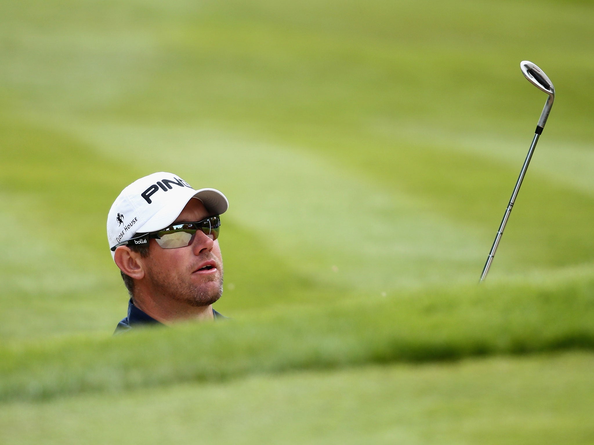 Heads up: A resurgent Lee Westwood plays out of a bunker at Wentworth, a course he says has ‘suited me’