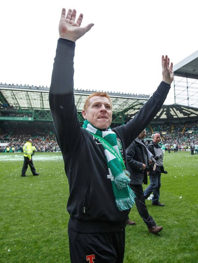 Buoyant: Neil Lennon enjoys the acclaim at Celtic Park after winning the League title in a season which also saw his team beat Barcelona at the stadium