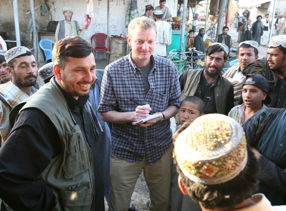 Beeston, centre, in Afghanistan in 2006; he always needed to know for himself what was going on