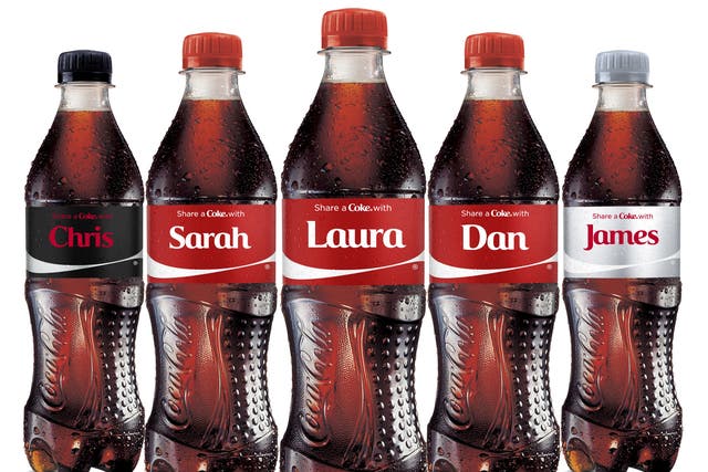 Coca Cola has removed the branding on 100 million bottles and cans and replaced it with the most popular 150 names in Britain.