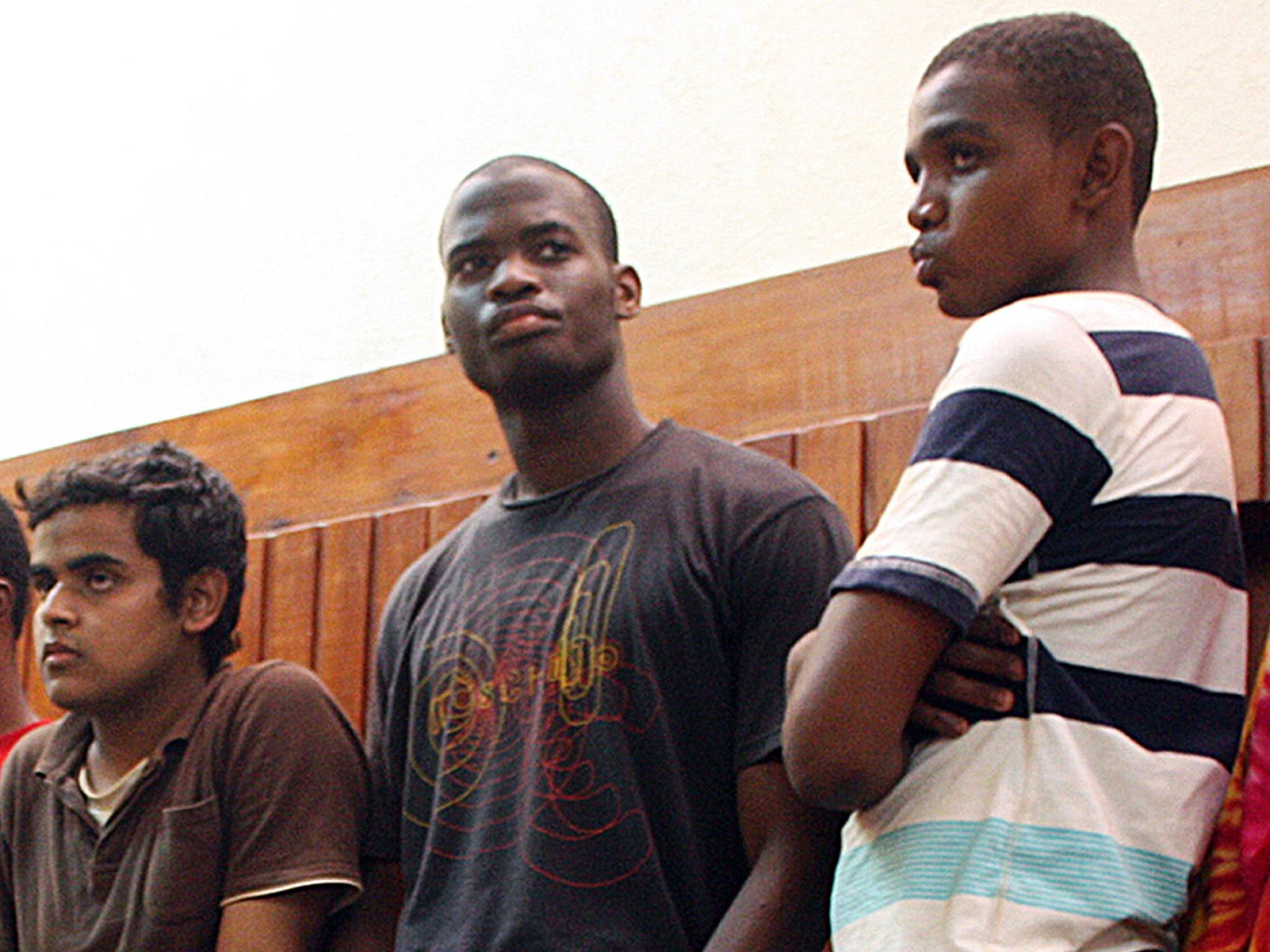 Suspected Woolwich attacker Michael Adebolajo, centre, has been discharged from hospital and taken into police custody, Scotland Yard said.