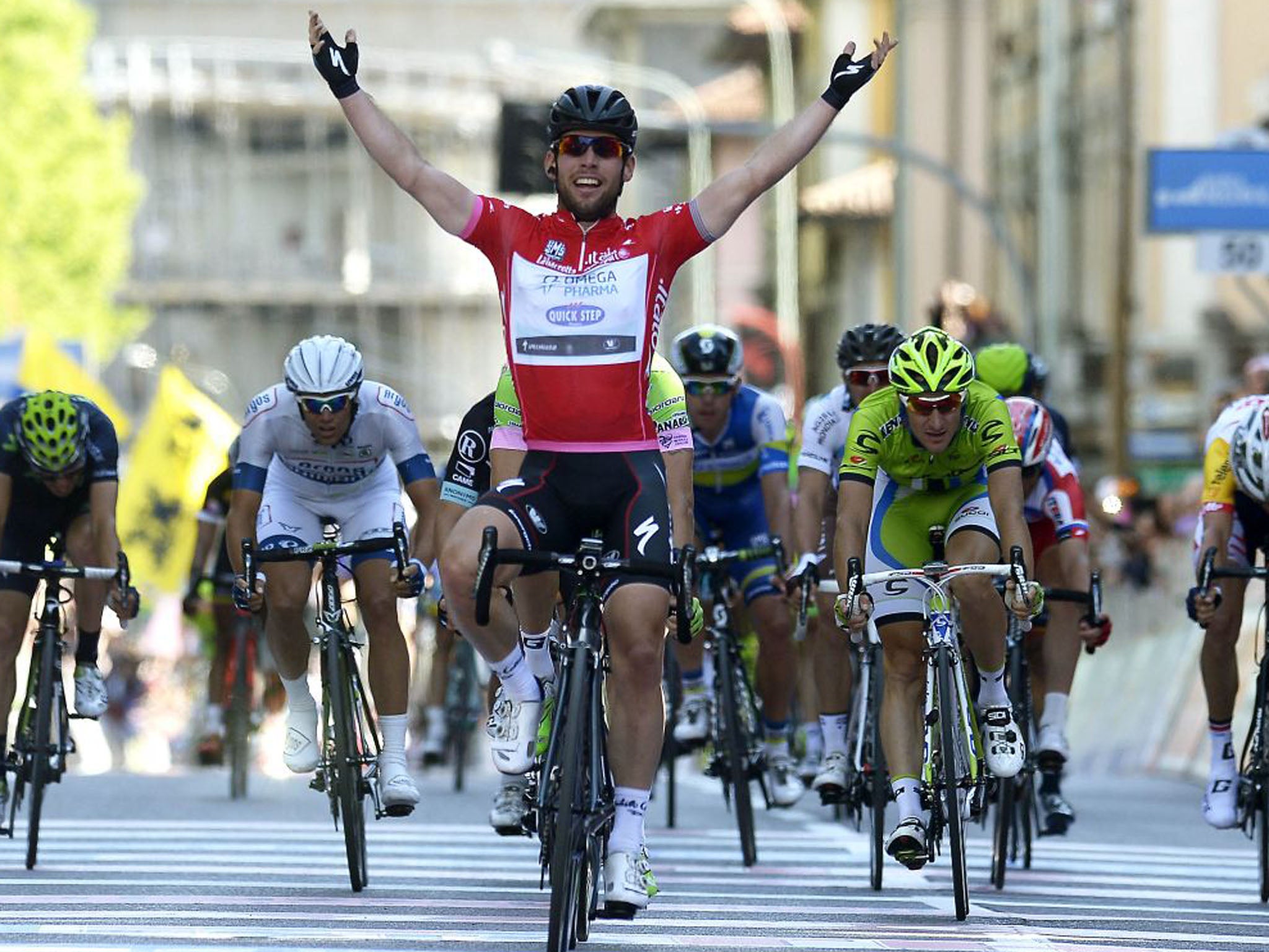 Cavendish celebrates as he crosses the finish line to win the final stage of the Giro d'Italia