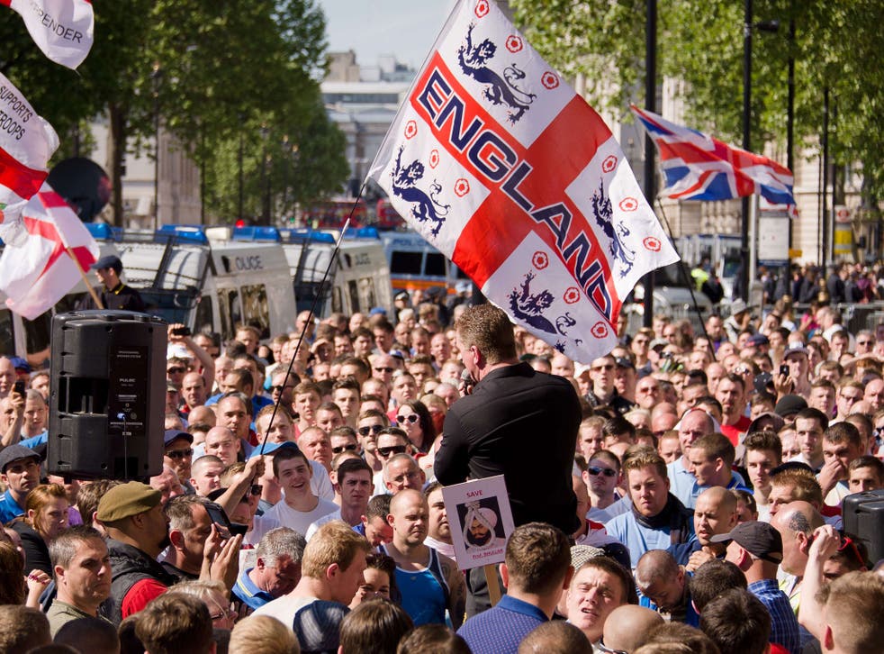 Kevin Caroll, EDL deputy leader, addresses supporters of the far-right English Defence League (EDL) near Downing Street in central London
