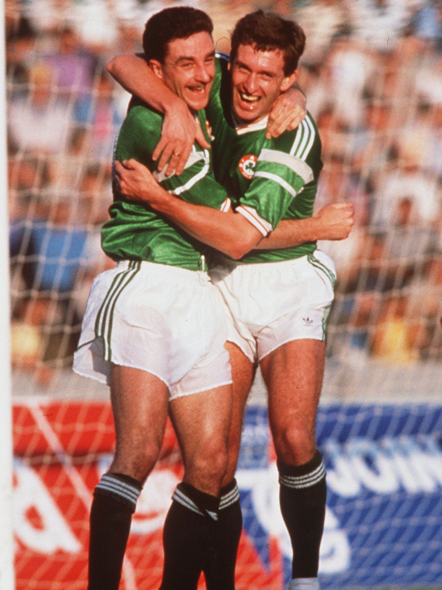 Kevin Sheedy, left, celebrates an Irish goal with John Aldridge, right, as Kevin Moran comes to join the fun back in 1989