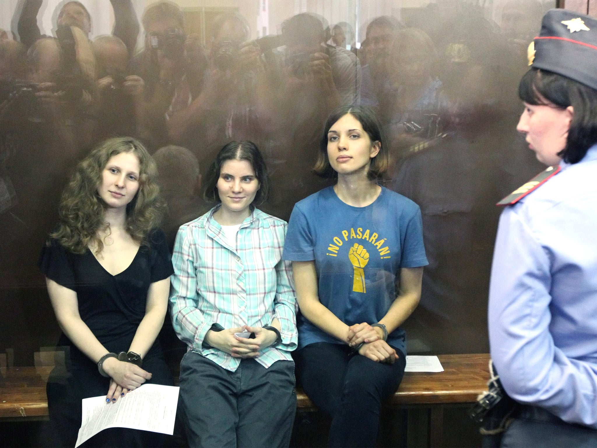 Maria Alekhina, Ekaterina Samutsevich and Nadezhda Tolokonnikova in court in 2012