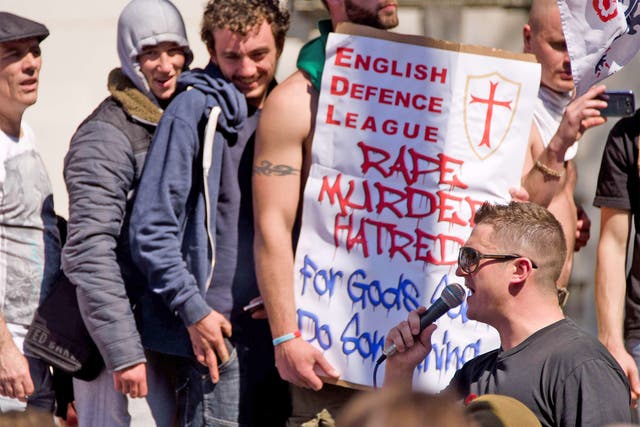 EDL Leader Tommy Robinson speaks to supporters during a demonstration near Downing Street on Monday