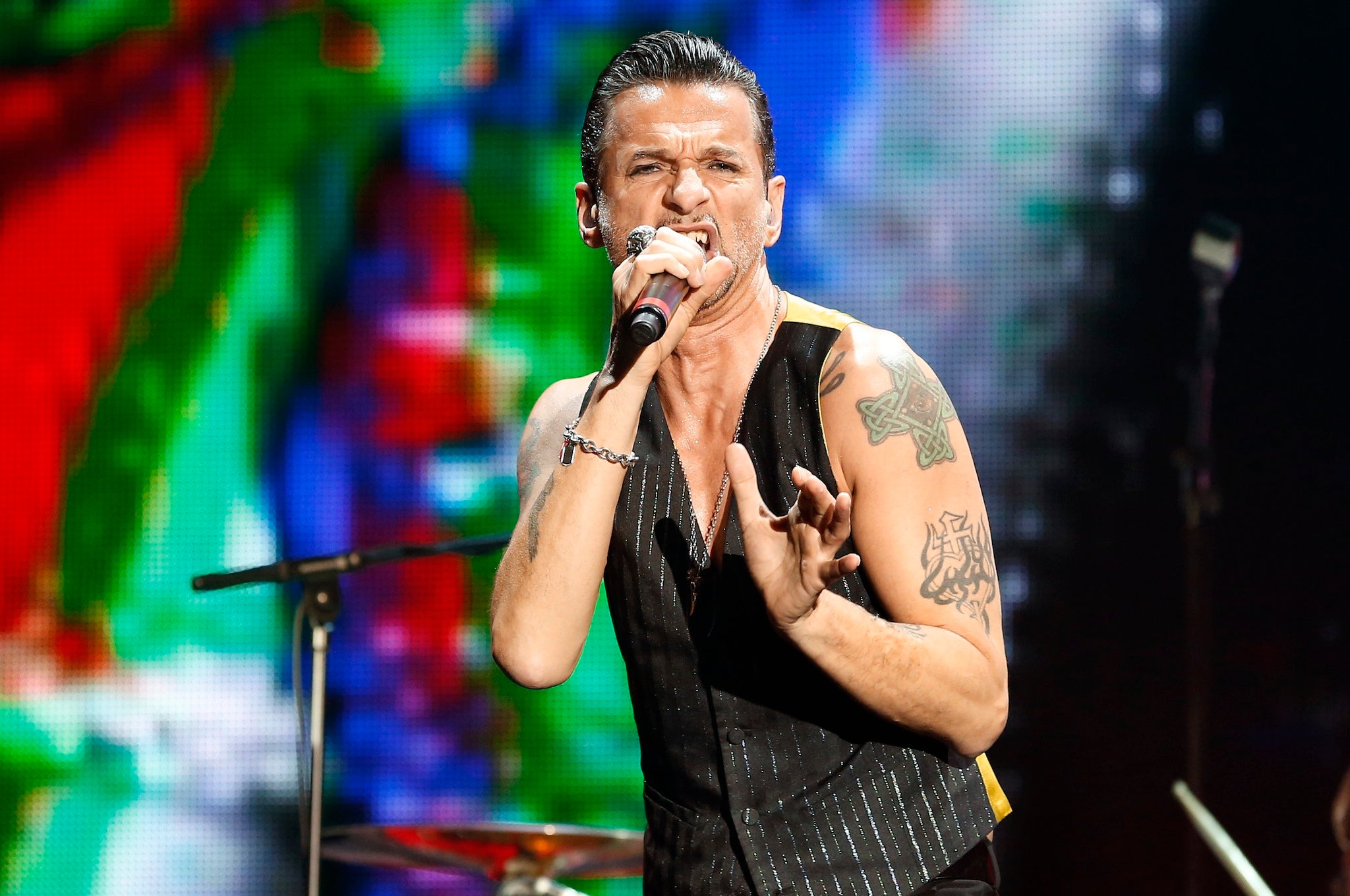 Lead singer of the British band 'Depeche Mode' Dave Gahan performs on stage during 'The delta machine tour'