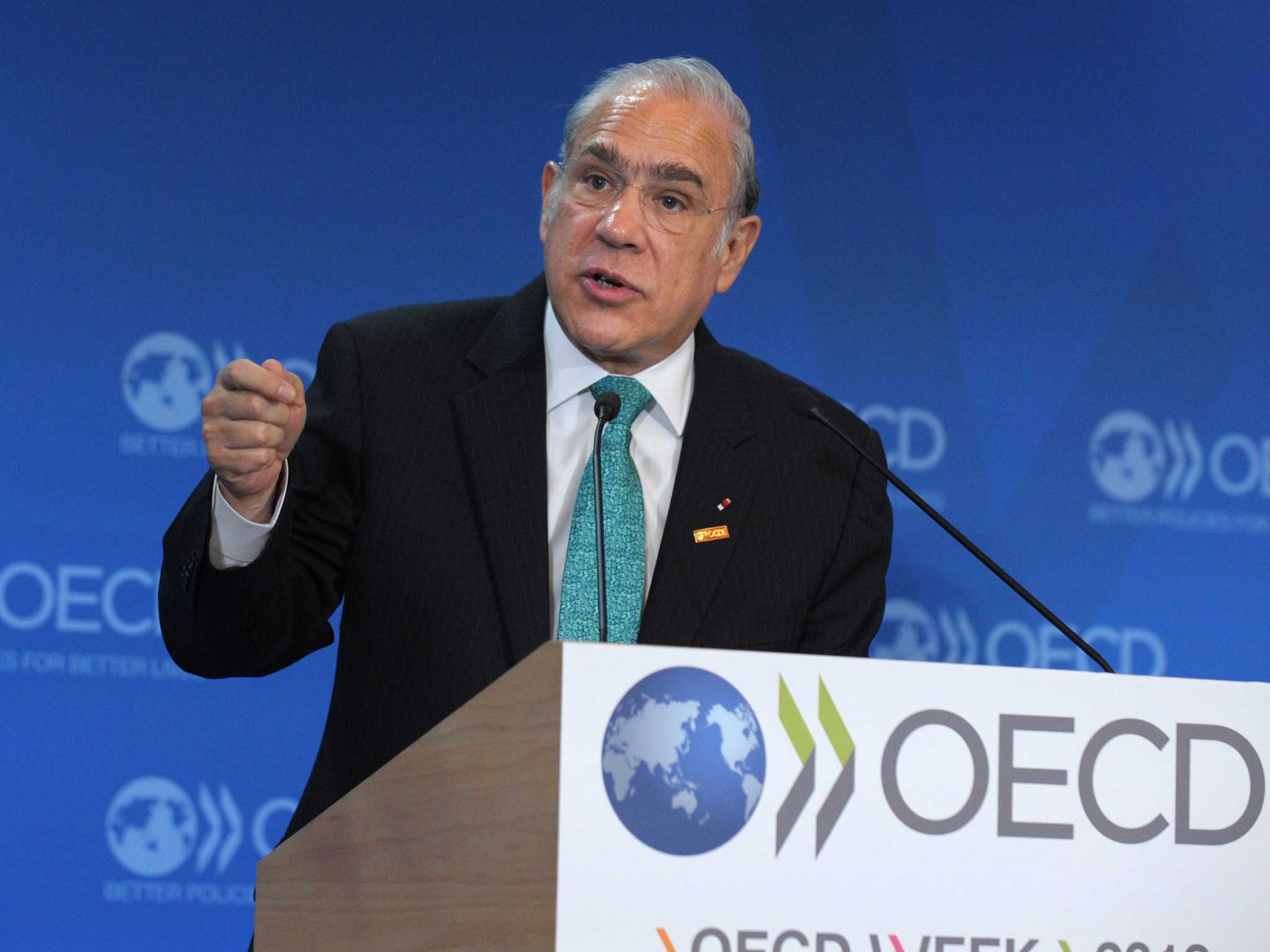 OECD Secretary General Angel Gurria talks while presenting the Economic Outlook during the OECD Week