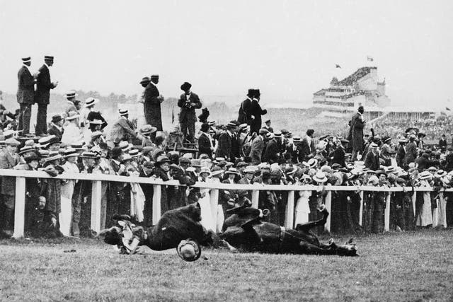 Emily Davison (1872 - 1913) is fatally injured as she tries to stop the King's horse 'Amner' on Derby Day, to draw attention to the Women's Suffragette movement