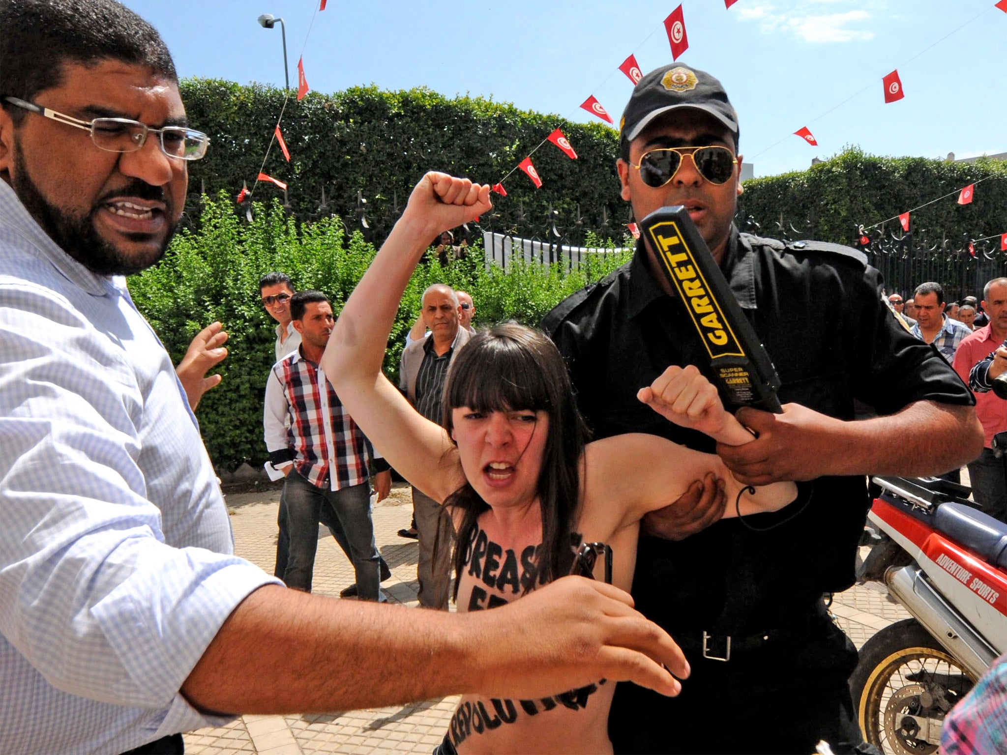 Security forces in Tunis arrest one of the three Femen activists