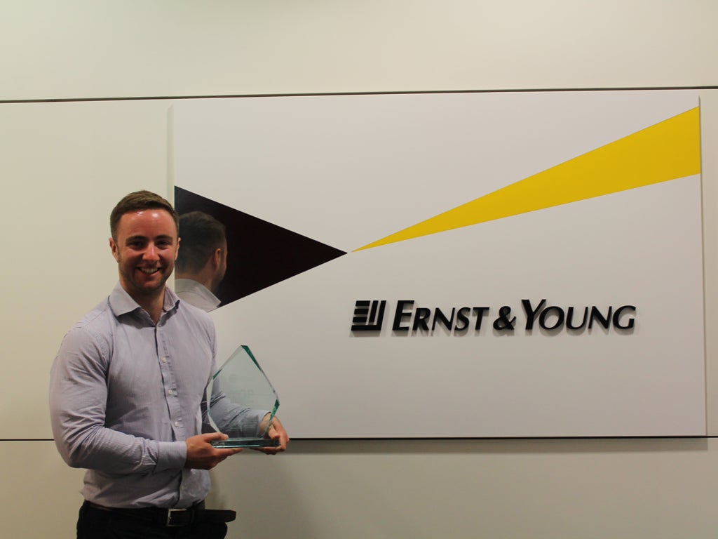 Steve Keith, employer brand officer – schools at Ernst & Young, celebrates their award
