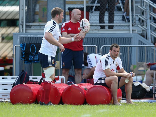 Injured Lions captain Sam Warburton looks on during training