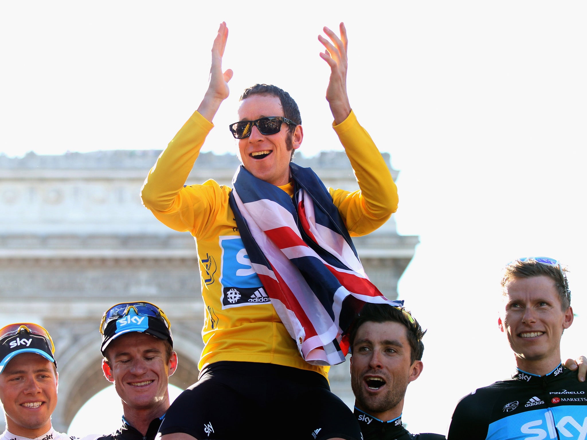 Bradley Wiggins pictured celebrating his Tour de France success in 2012